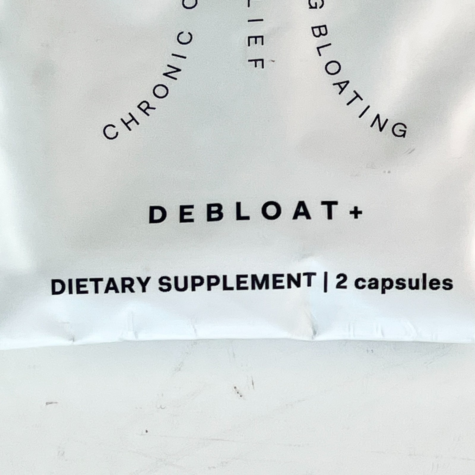 The Nue Co DeBloat+ Bloating Relief Supplement Gas 2 Capsules Sample Sealed New