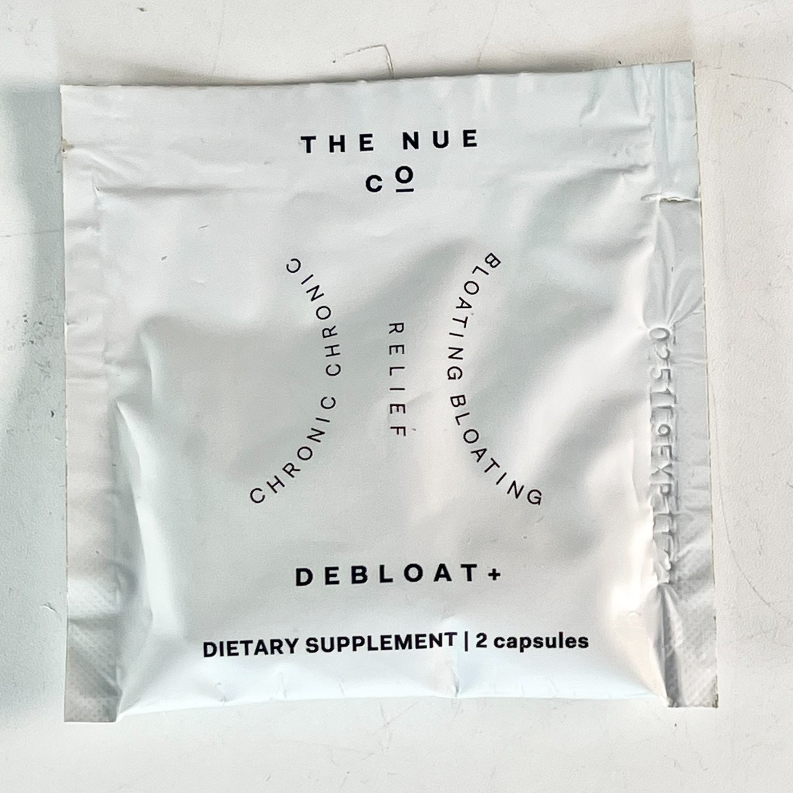 The Nue Co DeBloat+ Bloating Relief Supplement Gas 2 Capsules Sample Sealed New